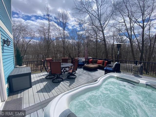 view of pool with a pool, outdoor dining space, and a deck