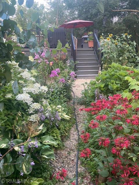 view of yard featuring stairs