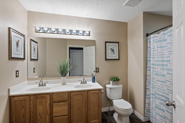 7619 Derby Ln, Shakopee, MN 55379 - full bath with double vanity, toilet, tile patterned floors, a textured ceiling, and a shower with curtain