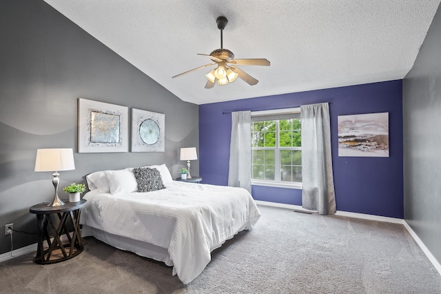 7619 Derby Ln, Shakopee, MN 55379 - carpeted bedroom with baseboards, a textured ceiling, vaulted ceiling, and a ceiling fan
