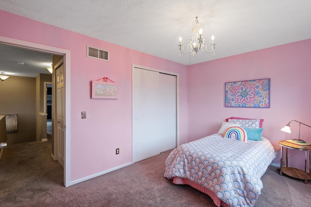 7619 Derby Ln, Shakopee, MN 55379 - bedroom with carpet floors, a chandelier, and a closet