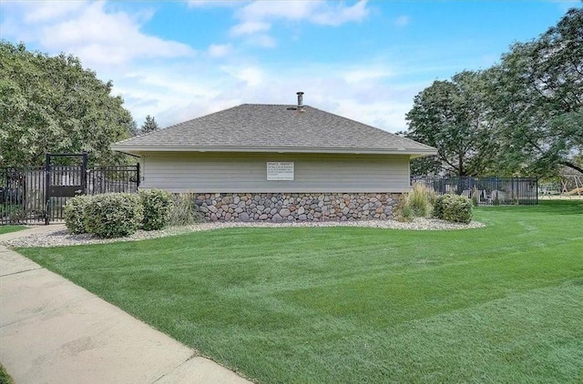7619 Derby Ln, Shakopee, MN 55379 - view of home's exterior with roof with shingles and stone siding