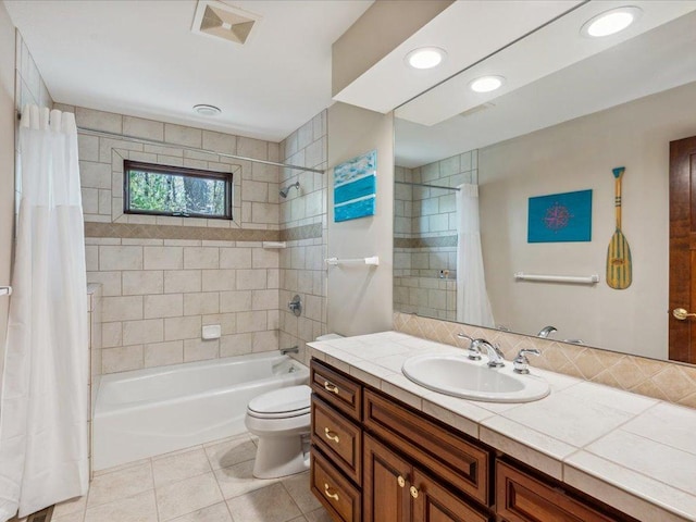 bathroom with tile patterned flooring, shower / bath combo with shower curtain, toilet, vanity, and backsplash