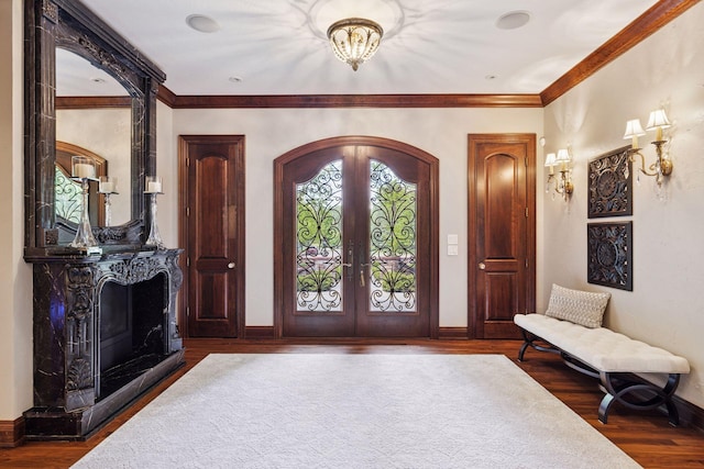 614 Hidden Creek Trl, Mendota Heights, MN 55118 - entryway featuring wood finished floors, french doors, baseboards, ornamental molding, and arched walkways
