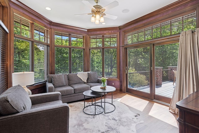 614 Hidden Creek Trl, Mendota Heights, MN 55118 - sunroom / solarium featuring wood finished floors and crown molding