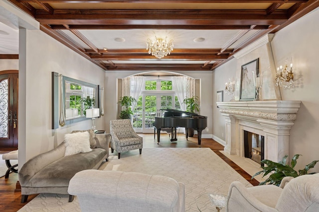 614 Hidden Creek Trl, Mendota Heights, MN 55118 - living area featuring coffered ceiling, a chandelier, wood finished floors, a fireplace, and beam ceiling