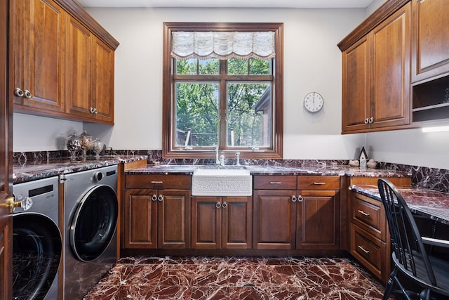 614 Hidden Creek Trl, Mendota Heights, MN 55118 - washroom with washing machine and dryer, cabinet space, and dark marble finish flooring