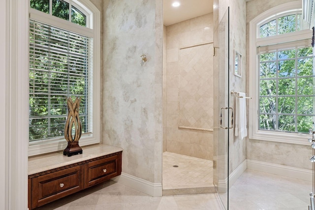 614 Hidden Creek Trl, Mendota Heights, MN 55118 - bathroom featuring a shower stall and baseboards