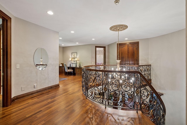 614 Hidden Creek Trl, Mendota Heights, MN 55118 - hallway featuring wood finished floors, an upstairs landing, recessed lighting, and baseboards