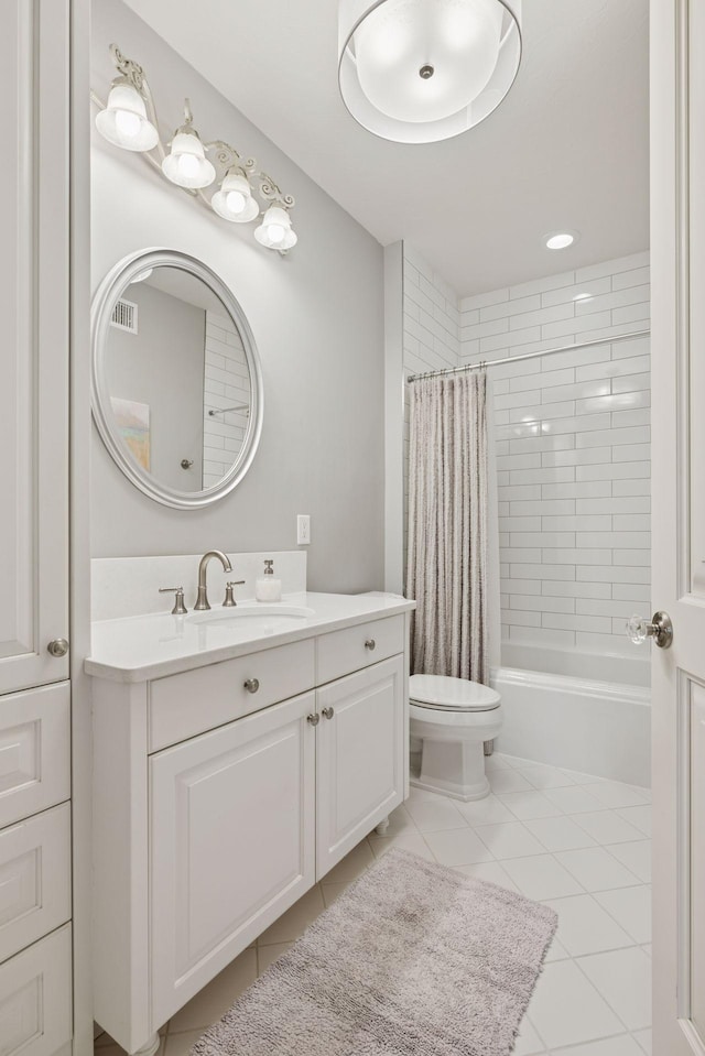 614 Hidden Creek Trl, Mendota Heights, MN 55118 - bathroom with toilet, vanity, tile patterned floors, and shower / tub combo with curtain