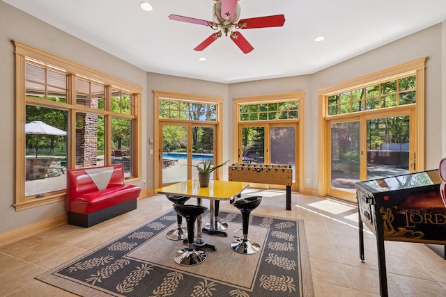 614 Hidden Creek Trl, Mendota Heights, MN 55118 - sunroom / solarium with baseboards, tile patterned flooring, and recessed lighting