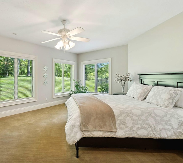 614 Hidden Creek Trl, Mendota Heights, MN 55118 - bedroom with baseboards, ceiling fan, and carpet flooring
