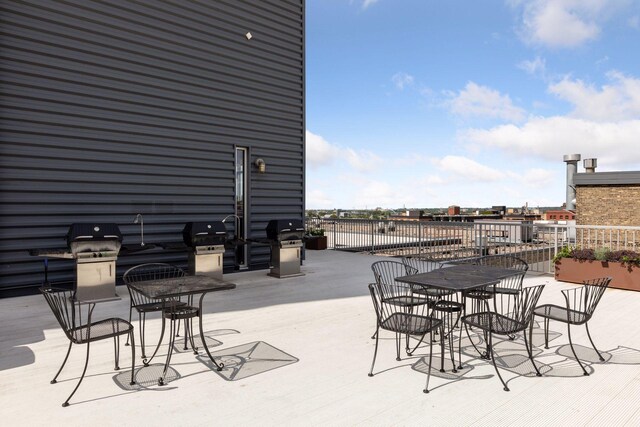 view of patio / terrace featuring a grill and outdoor dining space
