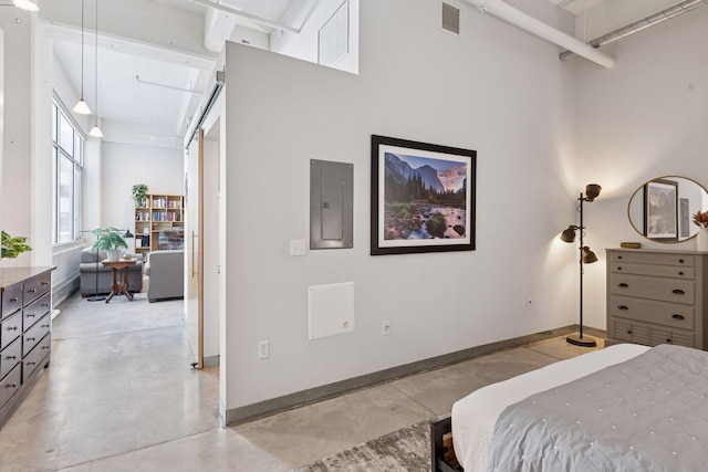 bedroom featuring electric panel, concrete flooring, baseboards, and a towering ceiling