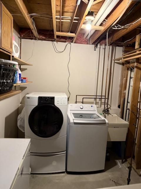 1415 Trailwood Ln SW, Faribault, MN 55021 - laundry area with washer and dryer and cabinet space