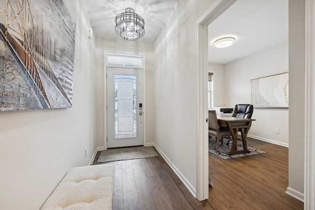17865 Graphite Ln, Lakeville, MN 55044 - entrance foyer with baseboards, wood finished floors, and a chandelier