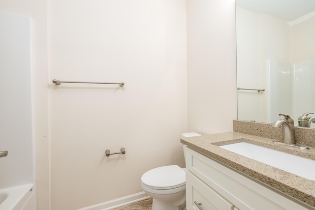 17865 Graphite Ln, Lakeville, MN 55044 - bathroom with baseboards, vanity, a shower, and toilet