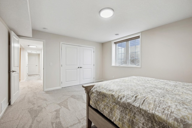 17865 Graphite Ln, Lakeville, MN 55044 - carpeted bedroom featuring a closet and baseboards