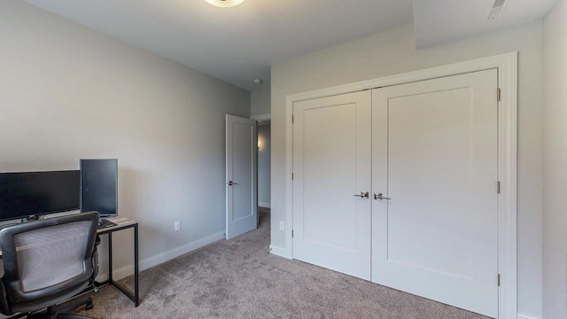 office area featuring carpet flooring, baseboards, and visible vents