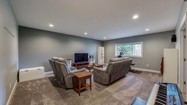 living room featuring carpet floors, recessed lighting, and baseboards