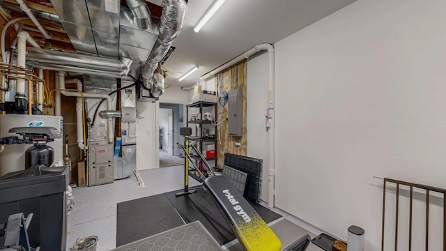exercise area with heating unit and electric panel