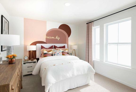 bedroom with light carpet