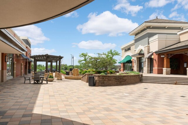 view of patio featuring a pergola