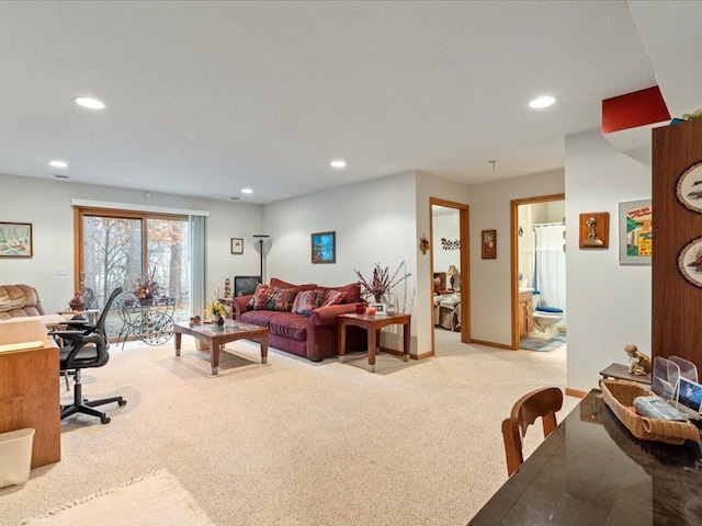 living room with baseboards, recessed lighting, and light colored carpet