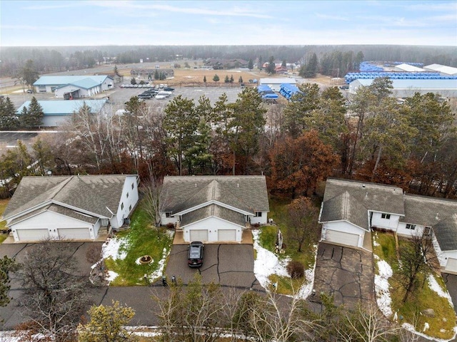 birds eye view of property with a residential view