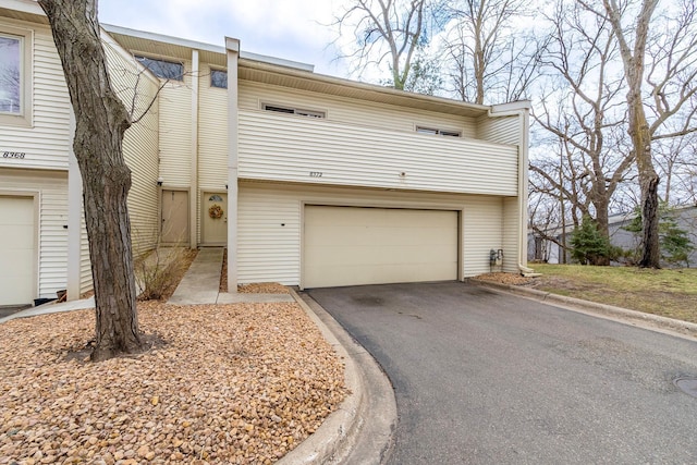 8372 Lower 138th Ct, Apple Valley, MN 55124 - multi unit property with an attached garage and driveway
