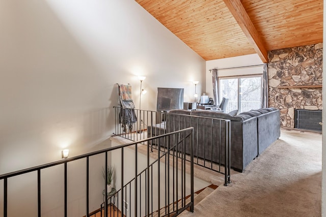 8372 Lower 138th Ct, Apple Valley, MN 55124 - living room with carpet, a wooden ceiling with exposed beams, high vaulted ceiling, and a stone fireplace