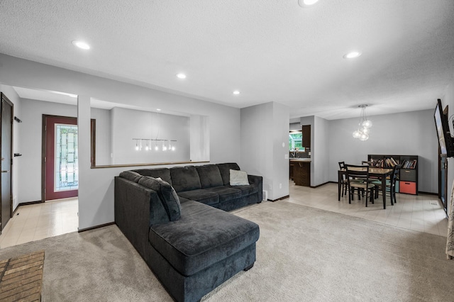 805 Ithaca Ln N, Plymouth, MN 55447 - living area with light colored carpet, plenty of natural light, recessed lighting, baseboards, and a textured ceiling