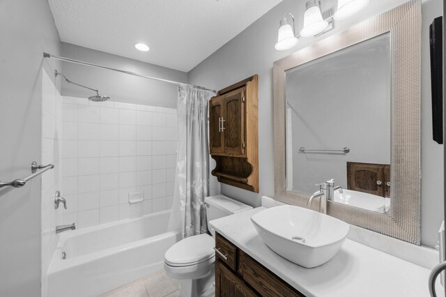 805 Ithaca Ln N, Plymouth, MN 55447 - bathroom featuring shower / tub combo, vanity, toilet, tile patterned flooring, and a textured ceiling
