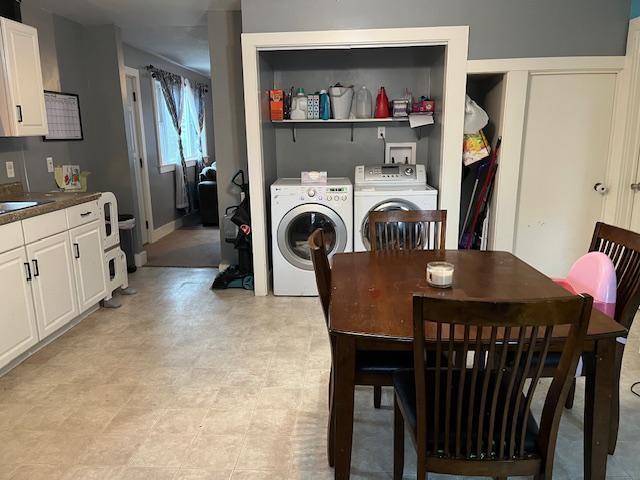 dining space featuring separate washer and dryer