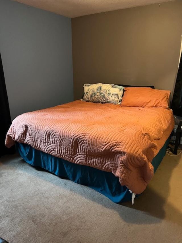 bedroom featuring carpet