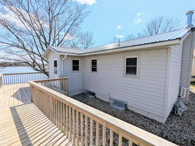46167 Jefferson Lake Dr, Cleveland Twp, MN 56017 - rear view of house featuring a wooden deck and metal roof