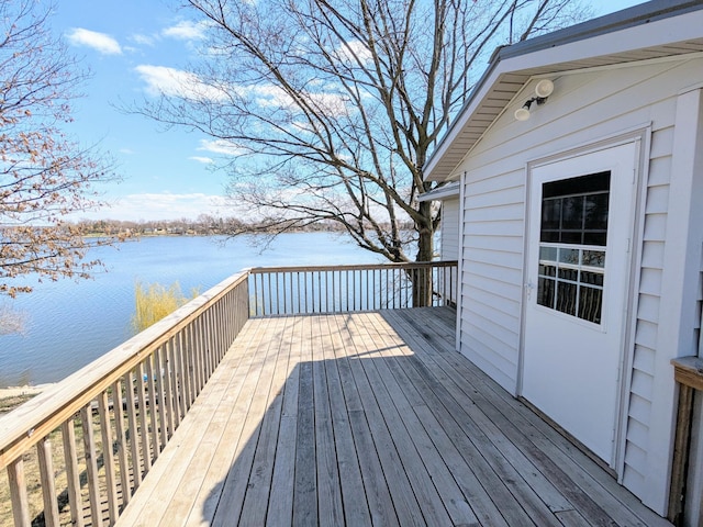 46167 Jefferson Lake Dr, Cleveland Twp, MN 56017 - wooden terrace with a water view