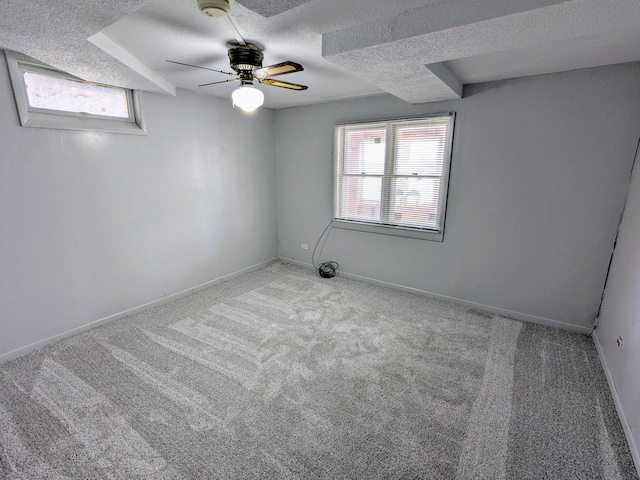 46167 Jefferson Lake Dr, Cleveland Twp, MN 56017 - carpeted spare room featuring baseboards, a ceiling fan, and a textured ceiling