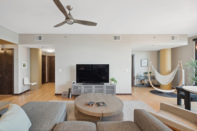 1240 2nd St Unit 526, Minneapolis, MN 55415 - living room featuring visible vents and light wood-style floors