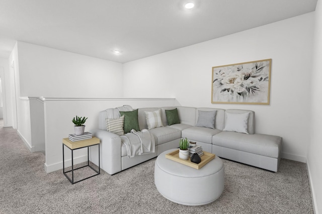 carpeted living room featuring baseboards and recessed lighting