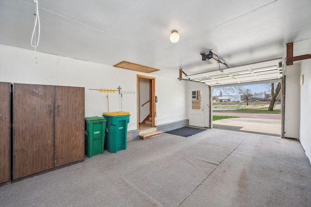 garage featuring a garage door opener