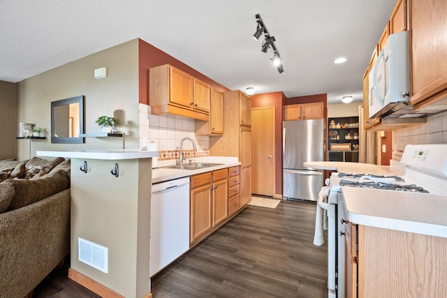 11215 16th St NE, Saint Michael, MN 55376 - kitchen with white appliances, a sink, open floor plan, dark wood-style flooring, and a textured ceiling