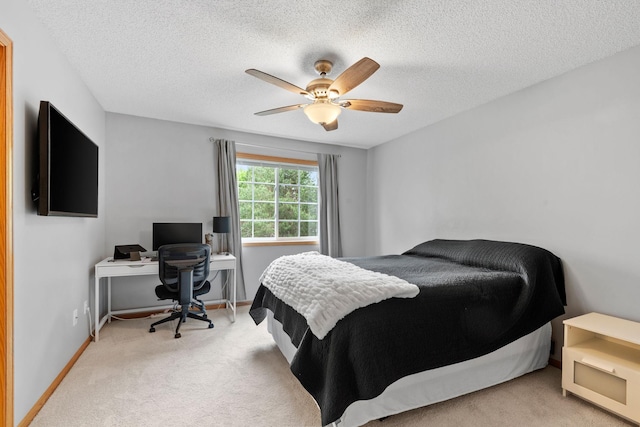 11215 16th St NE, Saint Michael, MN 55376 - carpeted bedroom with a desk, a textured ceiling, ceiling fan, and baseboards