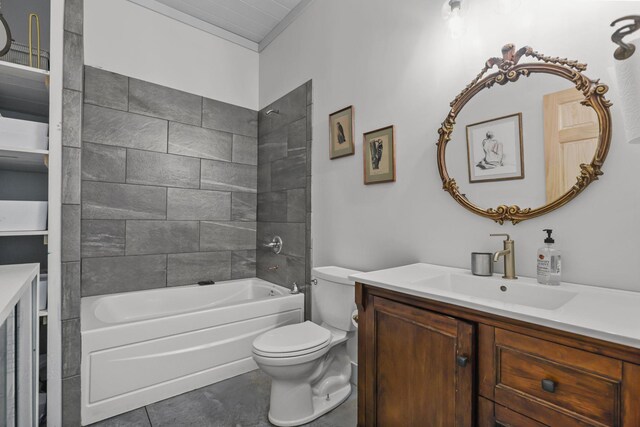 bathroom featuring vanity, washtub / shower combination, and toilet