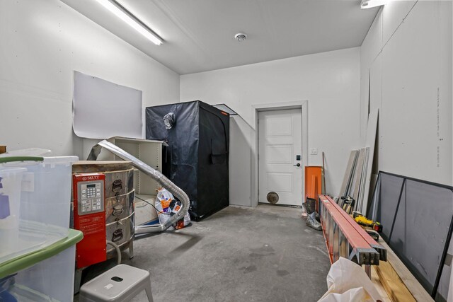 interior space featuring unfinished concrete floors