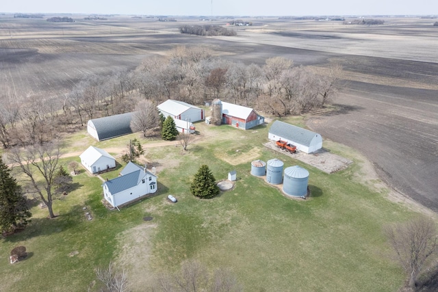 birds eye view of property featuring a rural view