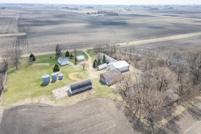 birds eye view of property featuring a rural view
