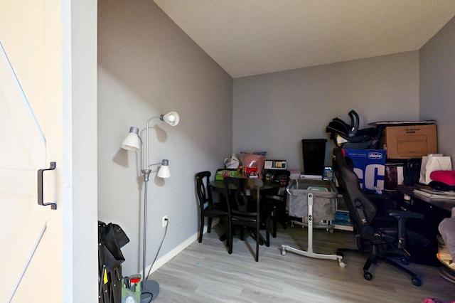 office area featuring wood finished floors and baseboards