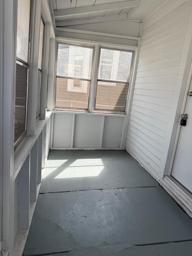 unfurnished sunroom with a wealth of natural light