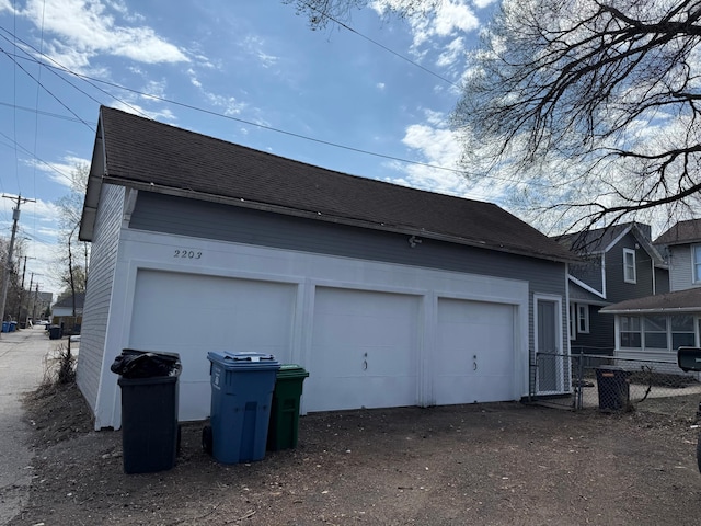 garage featuring fence